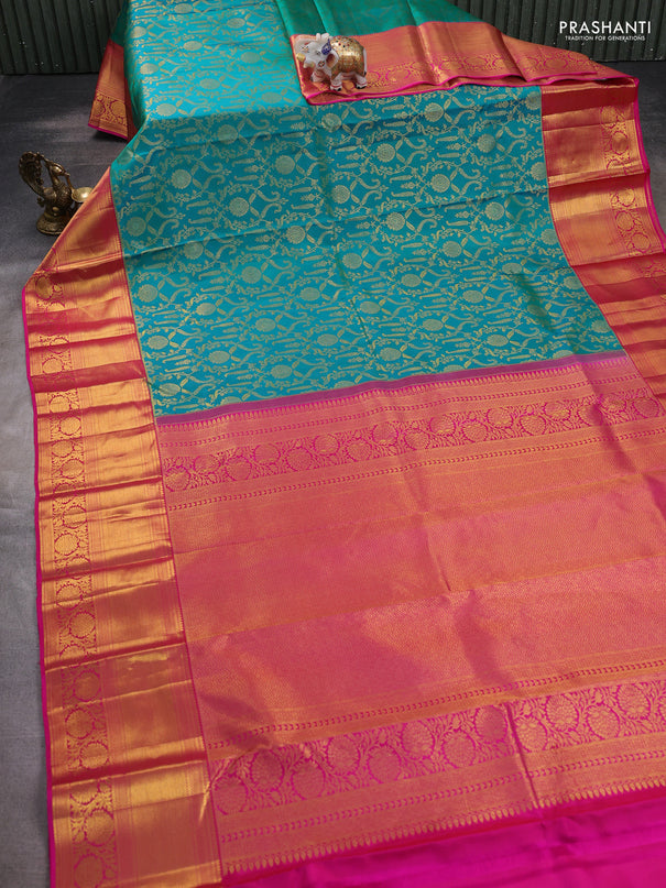 Pure kanchipuram silk saree dual shade of teal bluish green and pink with allover zari woven brocade weaves and zari woven border