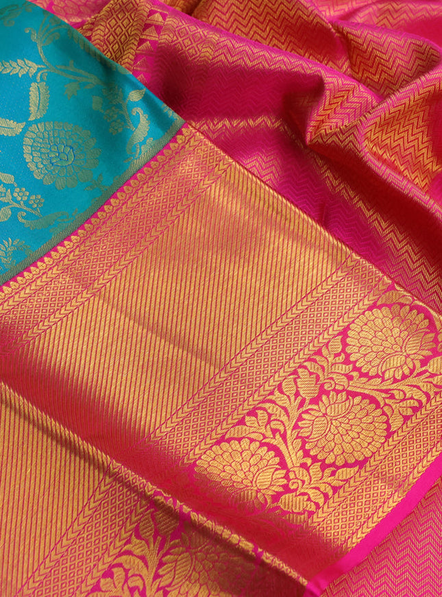 Pure kanchipuram silk saree dual shade of teal bluish green and pink with allover zari woven brocade weaves and zari woven border