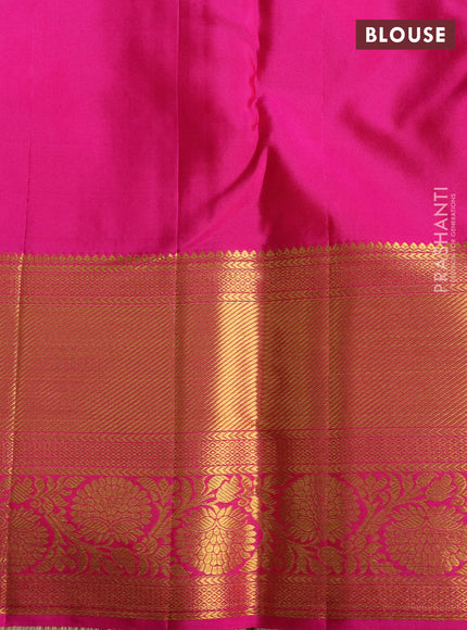 Pure kanchipuram silk saree dual shade of teal bluish green and pink with allover zari woven brocade weaves and zari woven border