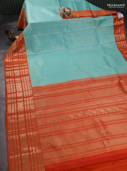 Pure kanchipuram silk saree teal blue and orange with allover zari checked pattern and zari woven border