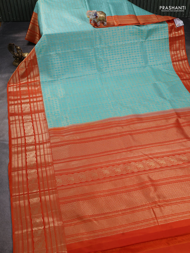 Pure kanchipuram silk saree teal blue and orange with allover zari checked pattern and zari woven border