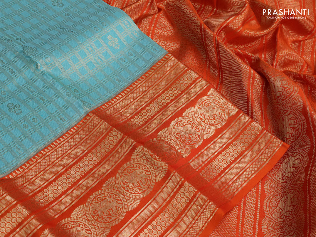 Pure kanchipuram silk saree teal blue and orange with allover zari checked pattern and zari woven border