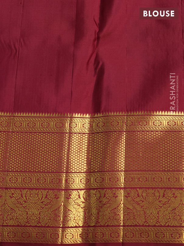 Pure kanchipuram silk saree off white and maroon with allover zari woven brocade weaves and zari woven border