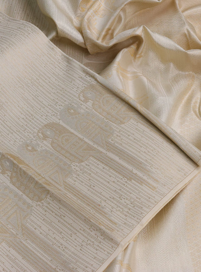 Pure kanchipuram silk saree off white with allover zari woven brocade weaves and zari woven border