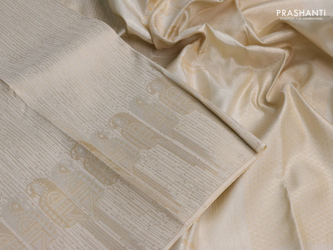 Pure kanchipuram silk saree off white with allover zari woven brocade weaves and zari woven border