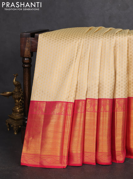 Pure kanchipuram silk saree cream and pink with allover zari woven 1000 butta weaves and zari woven border