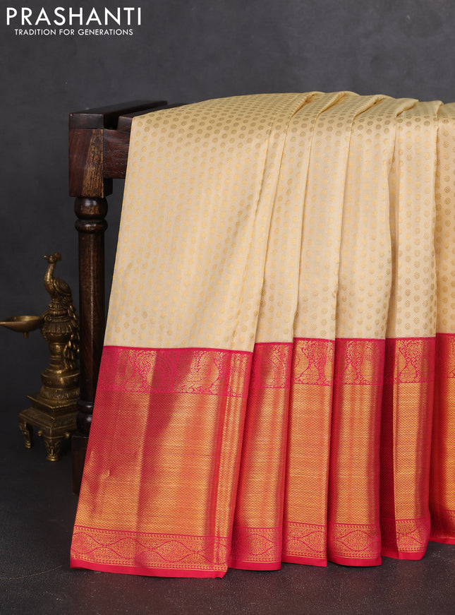 Pure kanchipuram silk saree cream and pink with allover zari woven 1000 butta weaves and zari woven border
