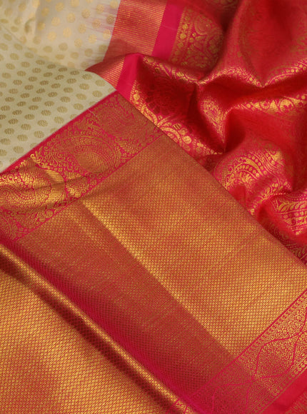 Pure kanchipuram silk saree cream and pink with allover zari woven 1000 butta weaves and zari woven border