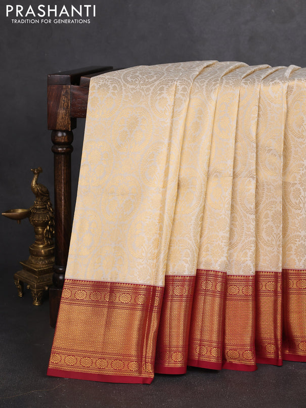Pure kanchipuram silk saree off white and maroon with allover zari woven brocade weaves and zari woven border