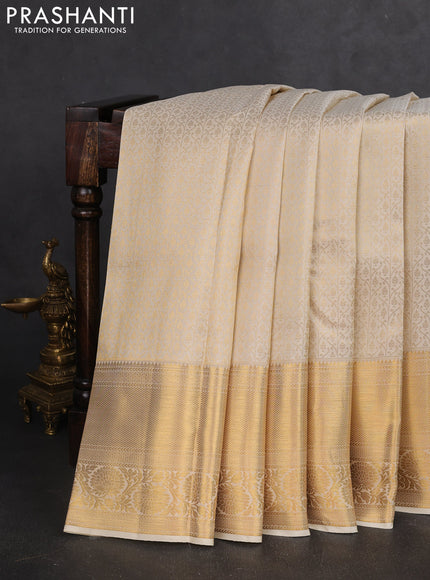 Pure kanchipuram silk saree off white with allover zari woven brocade weaves and zari woven border