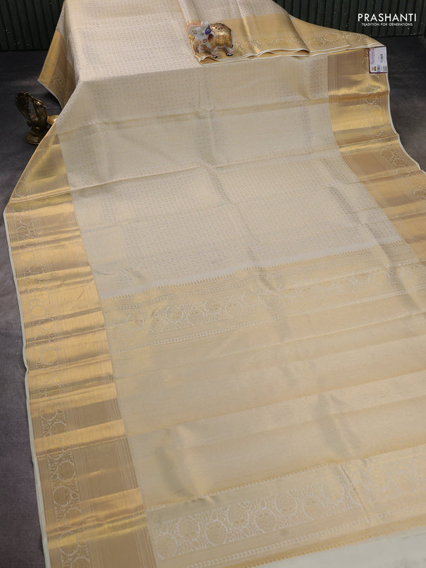 Pure kanchipuram silk saree off white with allover zari woven brocade weaves and zari woven border