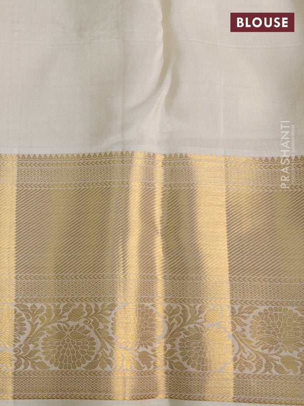 Pure kanchipuram silk saree off white with allover zari woven brocade weaves and zari woven border