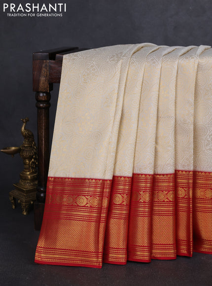 Pure kanchipuram silk saree off white and red with allover zari woven brocade weaves and zari woven border