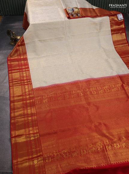 Pure kanchipuram silk saree off white and red with allover zari woven brocade weaves and zari woven border