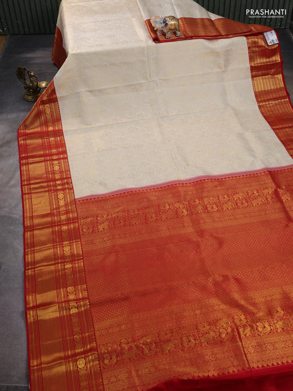 Pure kanchipuram silk saree off white and red with allover zari woven brocade weaves and zari woven border