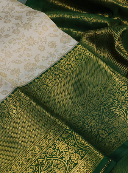 Pure kanchipuram silk saree off white and green with allover zari woven brocade weaves and zari woven border