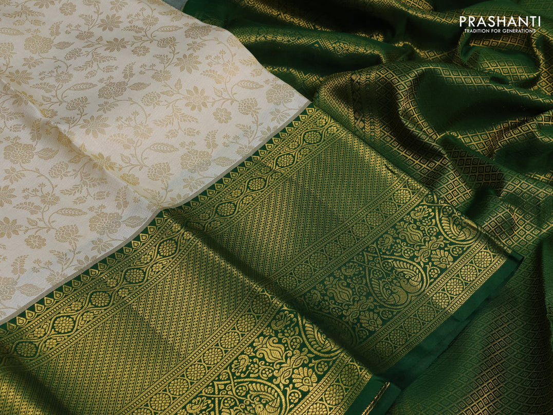 Pure kanchipuram silk saree off white and green with allover zari woven brocade weaves and zari woven border