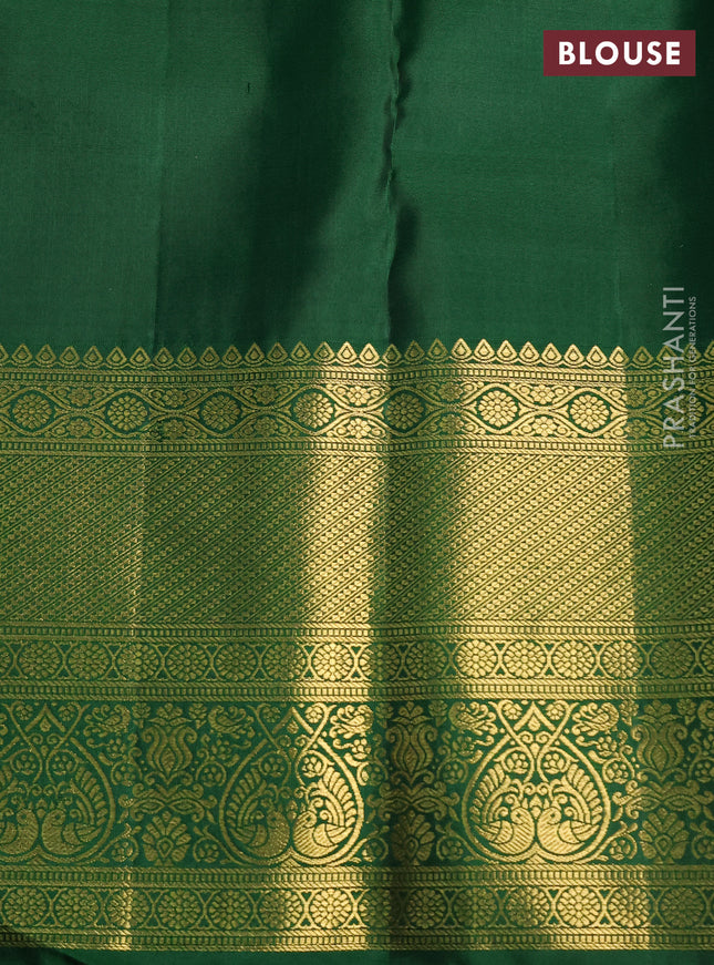 Pure kanchipuram silk saree off white and green with allover zari woven brocade weaves and zari woven border
