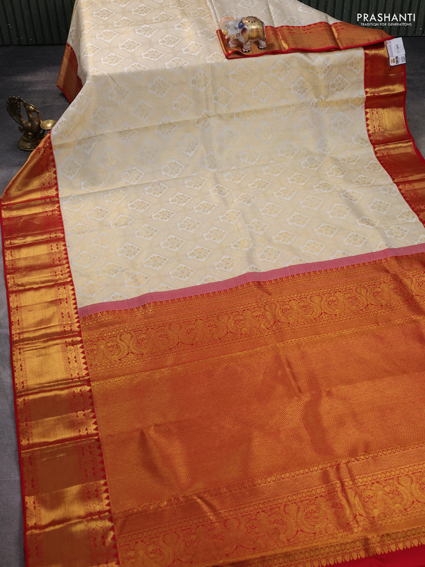 Pure kanchipuram silk saree off white and red with allover zari woven brocade weaves and zari woven border
