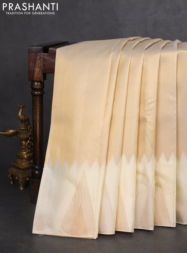 Pure kanchipuram silk saree off white with allover zari weaves and temple design zari woven border