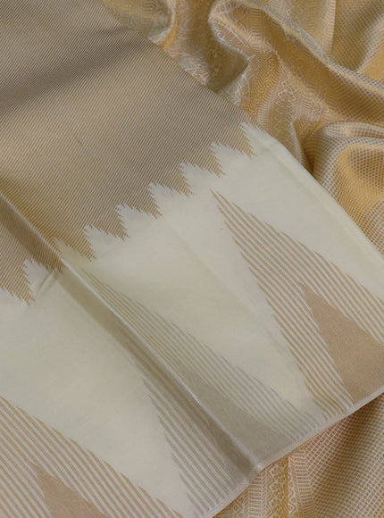 Pure kanchipuram silk saree off white with allover zari weaves and temple design zari woven border