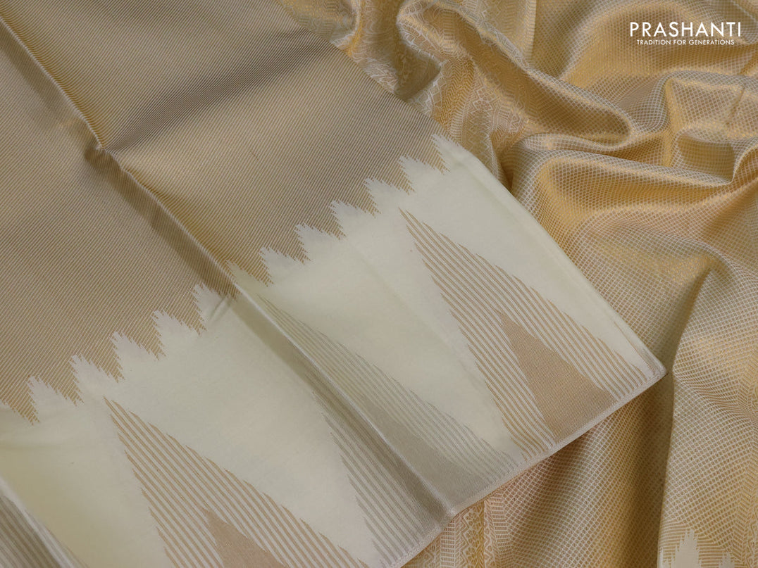 Pure kanchipuram silk saree off white with allover zari weaves and temple design zari woven border