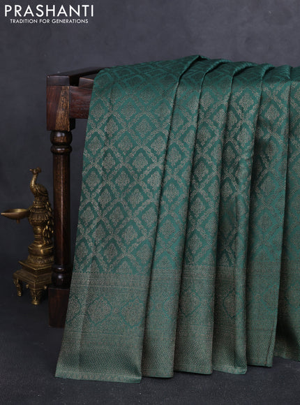 Pure kanchipuram silk saree teal green with allover antique zari weaves and woven border