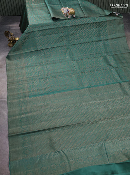Pure kanchipuram silk saree teal green with allover antique zari weaves and woven border