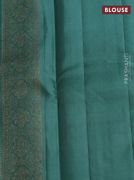 Pure kanchipuram silk saree teal green with allover antique zari weaves and woven border