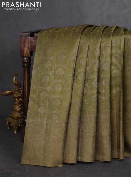 Pure kanchipuram silk saree mehendi green with allover antique zari weaves and woven border