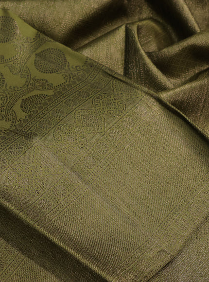 Pure kanchipuram silk saree mehendi green with allover antique zari weaves and woven border
