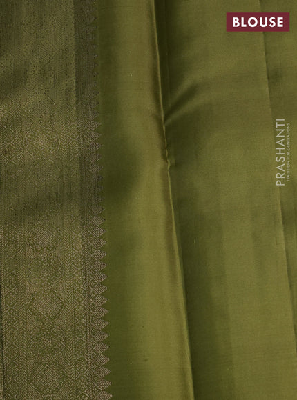 Pure kanchipuram silk saree mehendi green with allover antique zari weaves and woven border