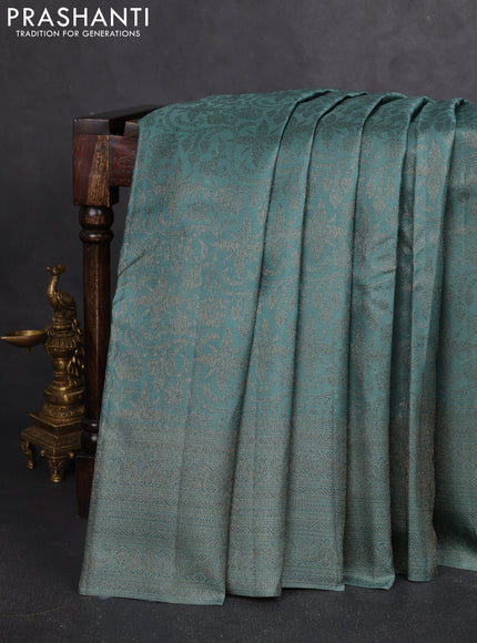 Pure kanchipuram silk saree teal shade with allover antique zari weaves and woven border