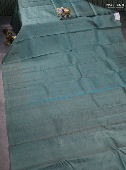 Pure kanchipuram silk saree teal shade with allover antique zari weaves and woven border