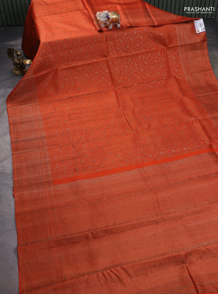Pure kanchipuram silk saree orange with allover antique zari weaves and woven border