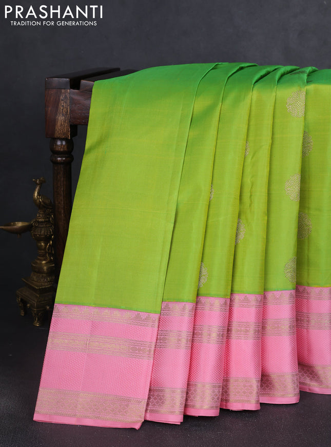 Pure kanchipuram silk saree light green and peach pink with zari woven buttas and rich zari woven border