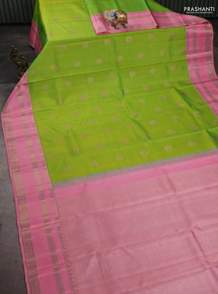 Pure kanchipuram silk saree light green and peach pink with zari woven buttas and rich zari woven border