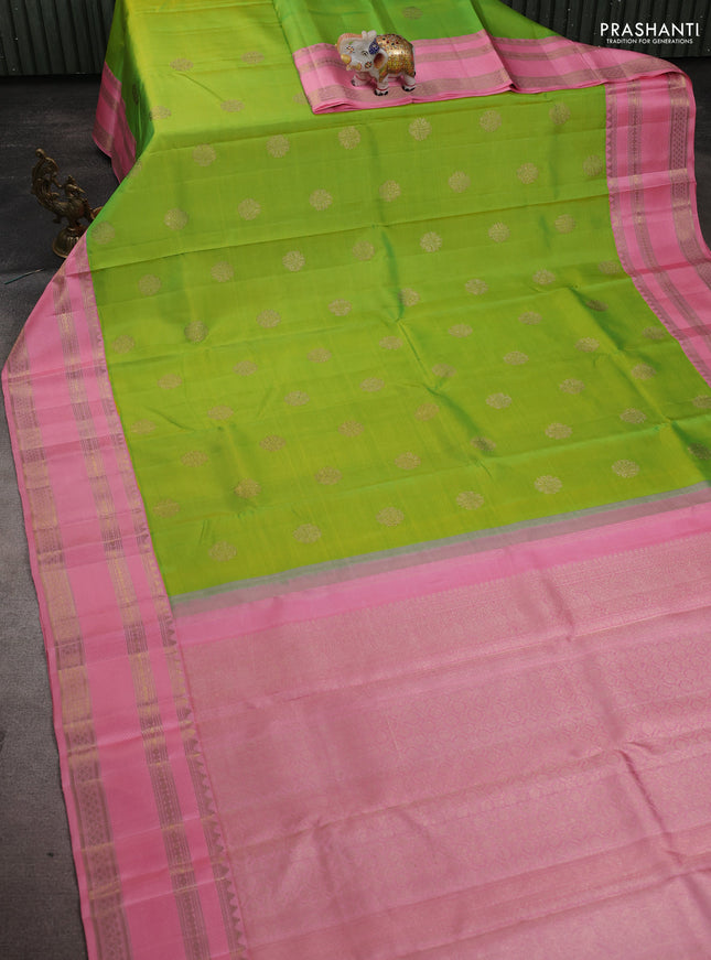 Pure kanchipuram silk saree light green and peach pink with zari woven buttas and rich zari woven border