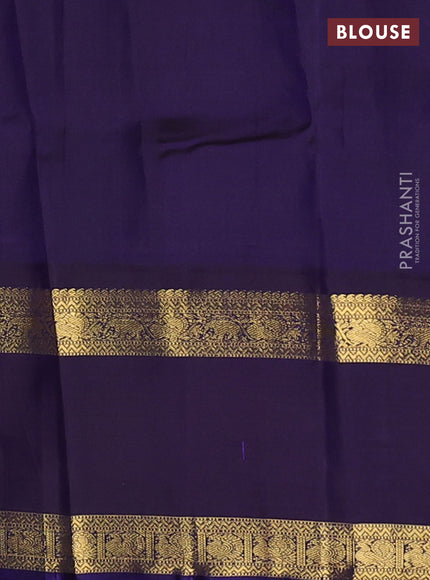 Pure kanchipuram silk saree pastel peach and dual shade of jamun with zari woven buttas and long rettapet zari woven korvai border