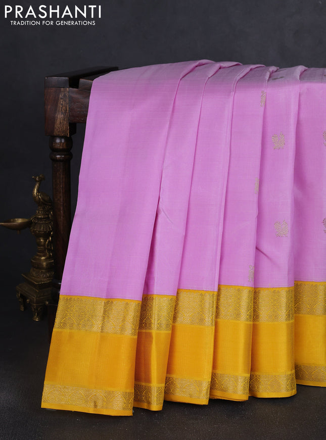 Pure kanchipuram silk saree mild lavender and yellow with zari woven buttas and rich zari woven korvai border