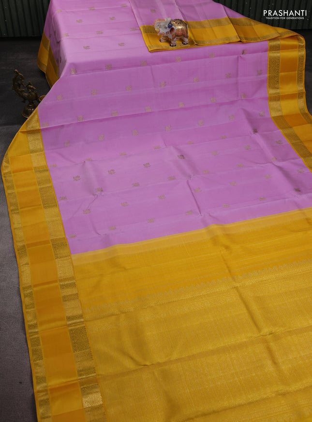 Pure kanchipuram silk saree mild lavender and yellow with zari woven buttas and rich zari woven korvai border