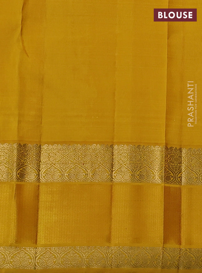 Pure kanchipuram silk saree mild lavender and yellow with zari woven buttas and rich zari woven korvai border
