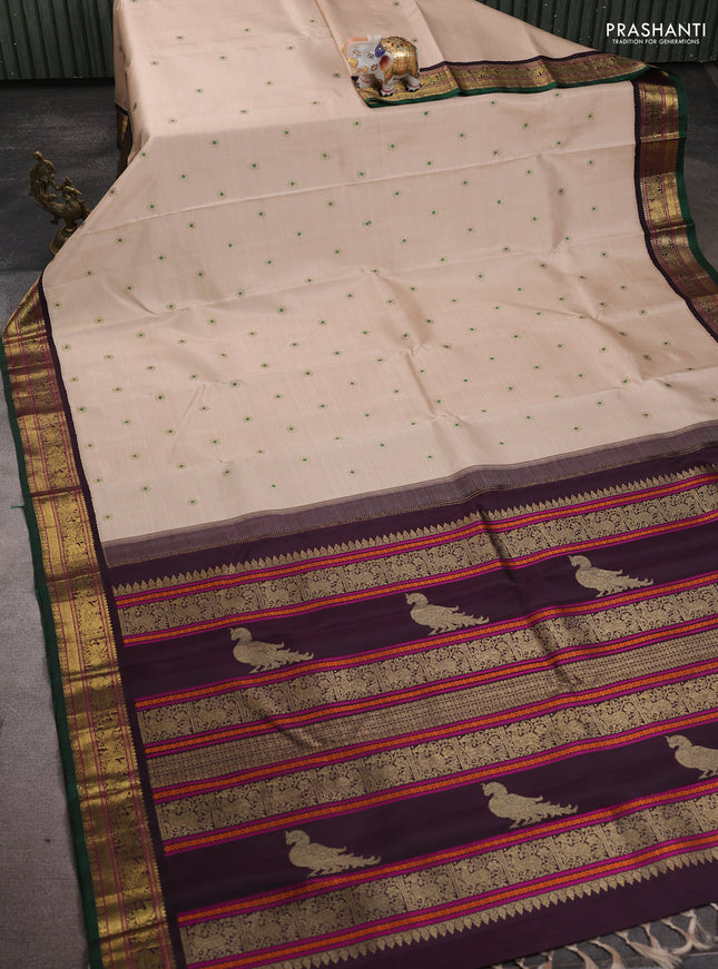 Pure kanchipuram silk saree beige and jamun shade with thread & zari woven buttas and rich zari woven korvai border