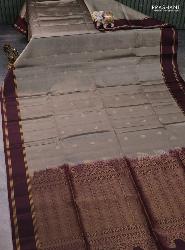 Pure soft silk saree grey and deep maroon with allover zari woven buttas and rettapet zari woven border