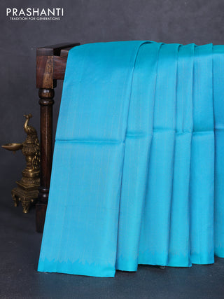 Pure soft silk saree teal blue and pastel purple with allover silver zari brocade weaves in borderless style