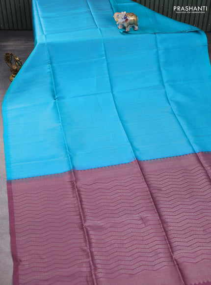 Pure soft silk saree teal blue and pastel purple with allover silver zari brocade weaves in borderless style