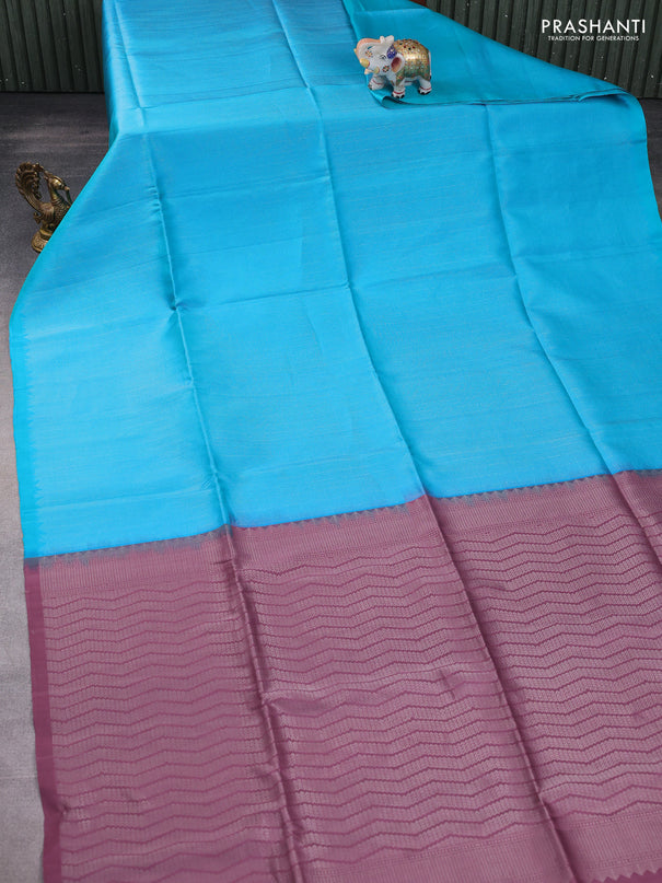 Pure soft silk saree teal blue and pastel purple with allover silver zari brocade weaves in borderless style