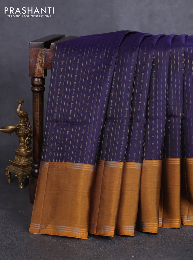 Pure soft silk saree navy blue and dark mustard with allover zari weaves and rettapet zari woven border