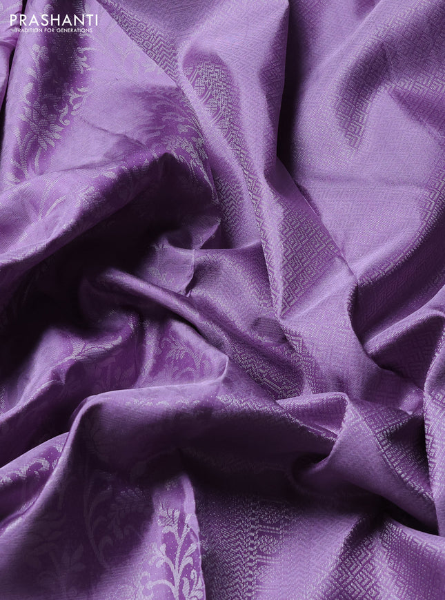 Pure soft silk saree lavender with allover zari brocade weaves and silver zari woven border