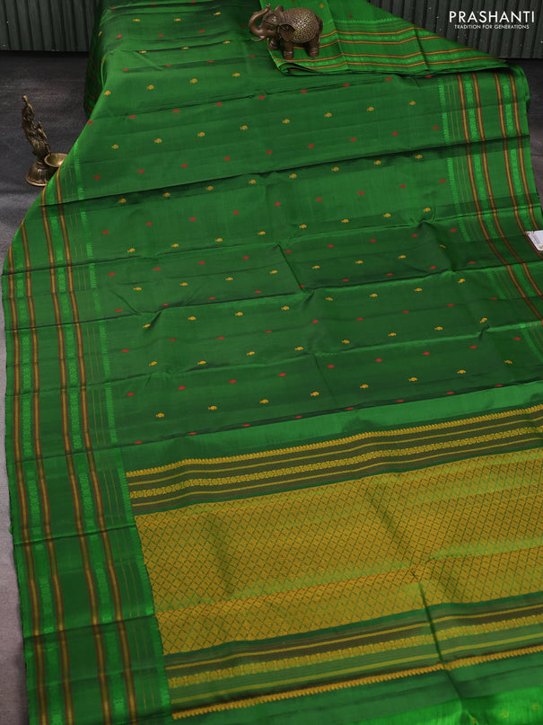 Pure soft silk saree green with allover thread woven buttas and rettapet thread woven border